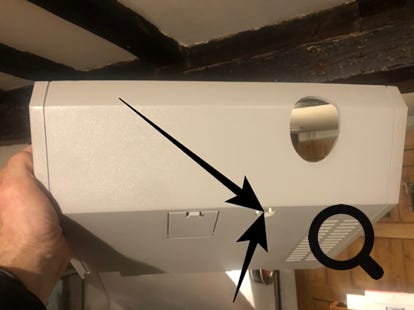 Photo showing the obscured location of the Netaheat Profile reset button location.